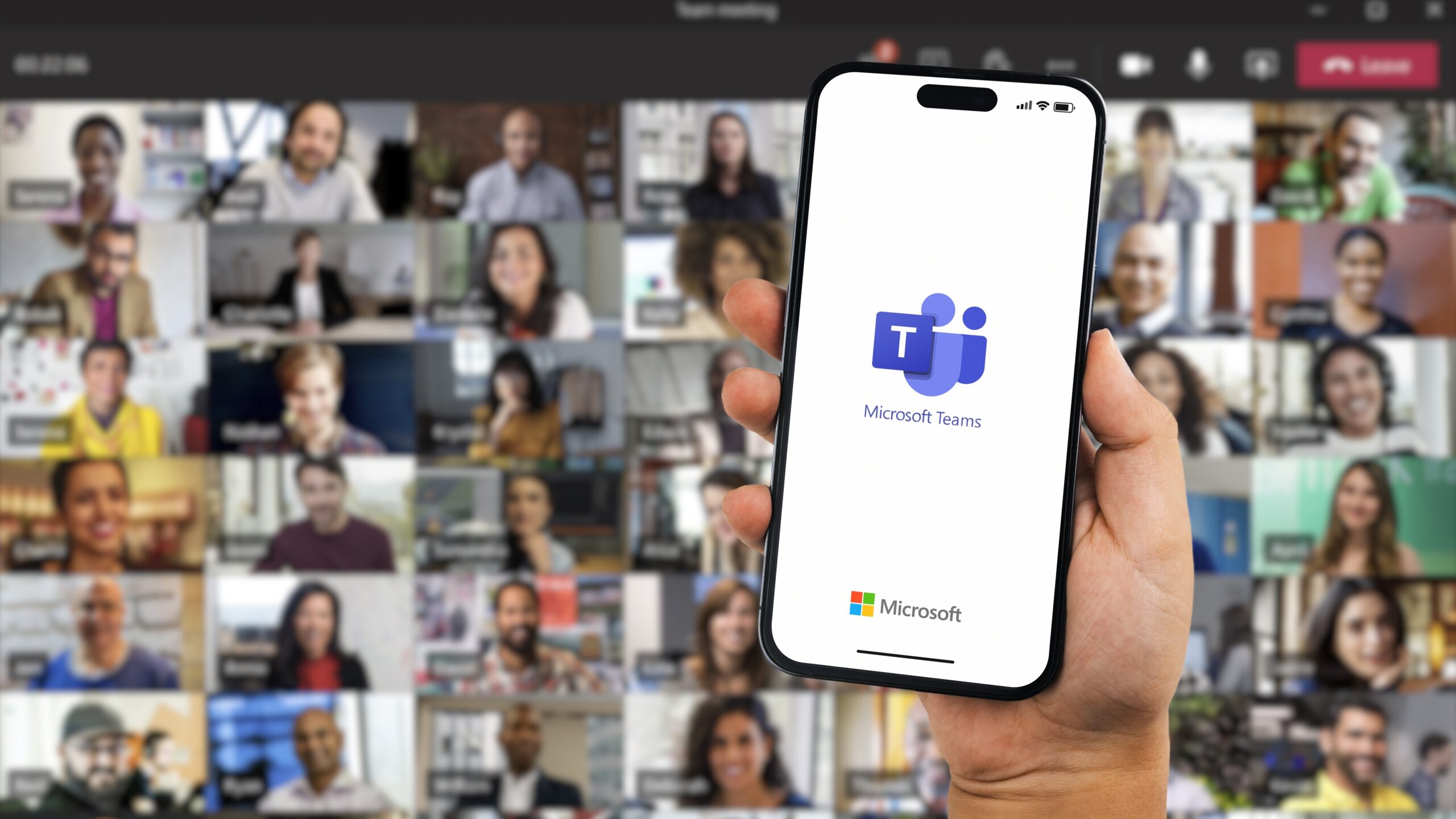 Boy,Holding,A,Smartphone,Iphone,14,Pro,With,Microsoft,Teams